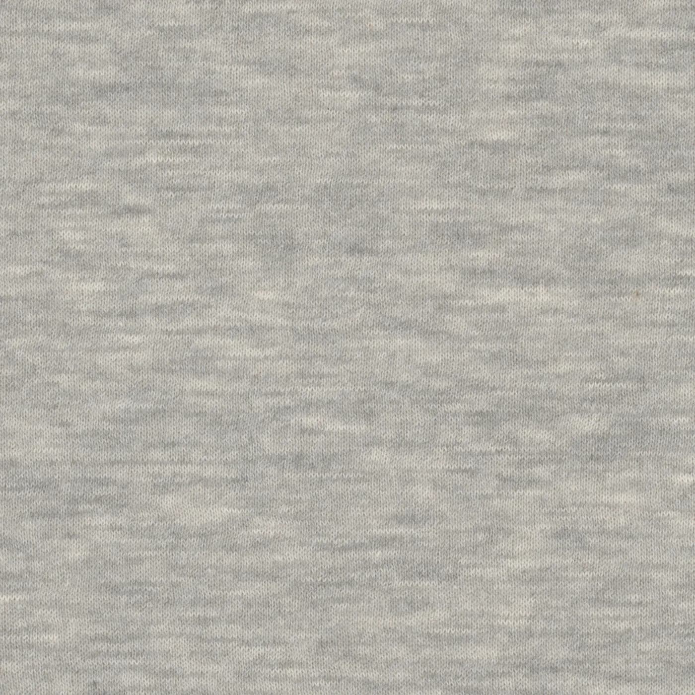 Primer plano de tejido single jersey gris jaspeado